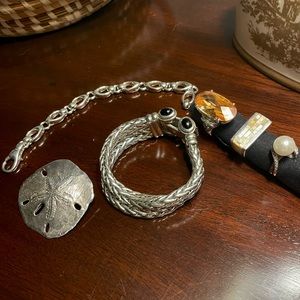 Assortment of sterling silver jewelry all bought in Charleston SC.